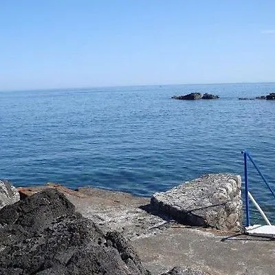 Nike Giardini Naxos